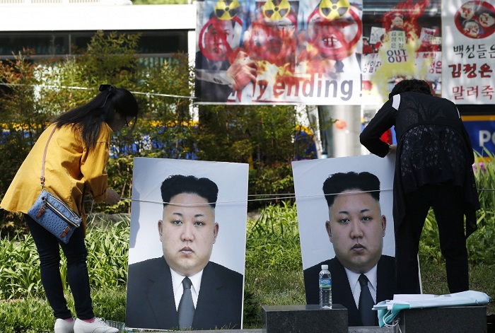 North Korea puts midrange missile on standby